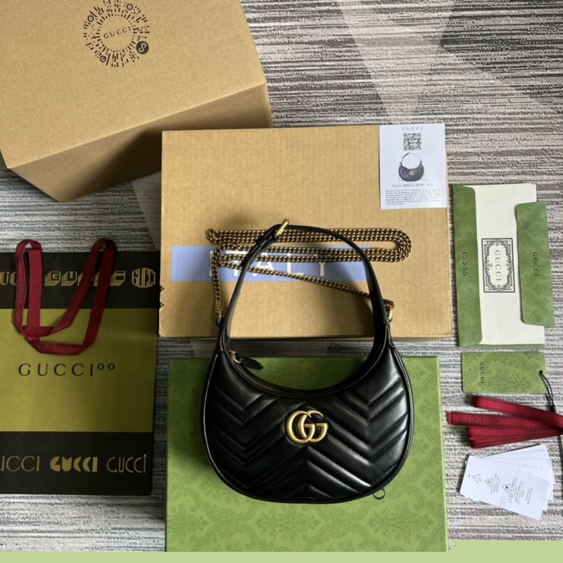G*u*i top handle bags